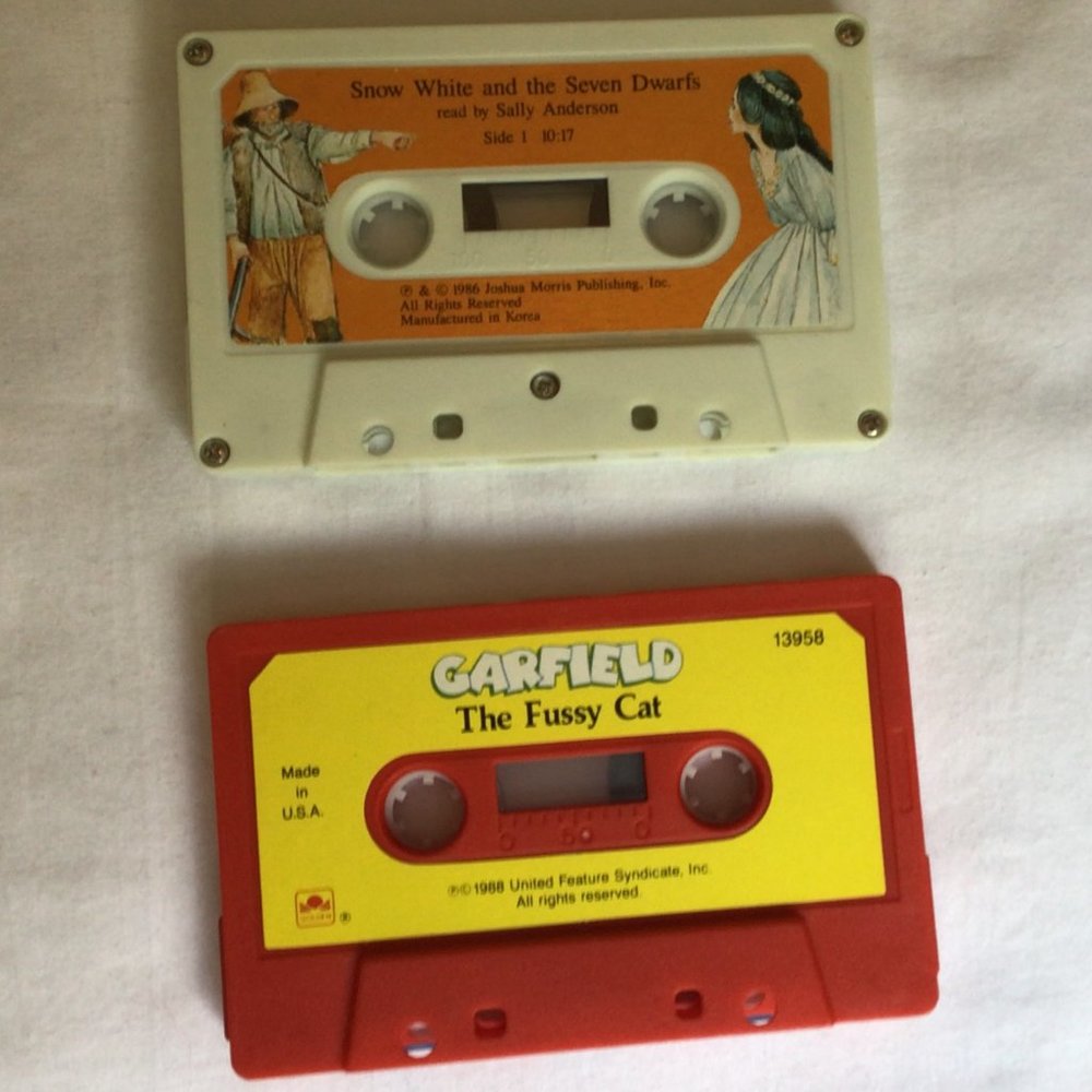 Two Kid's cassette tapes; Garfield The Fussy Cat, Snow White & the Seven Dwarfs